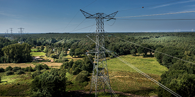 high-voltage line in natural landscape