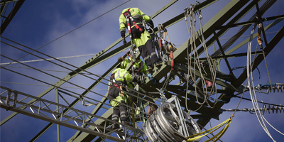 people working in pylons